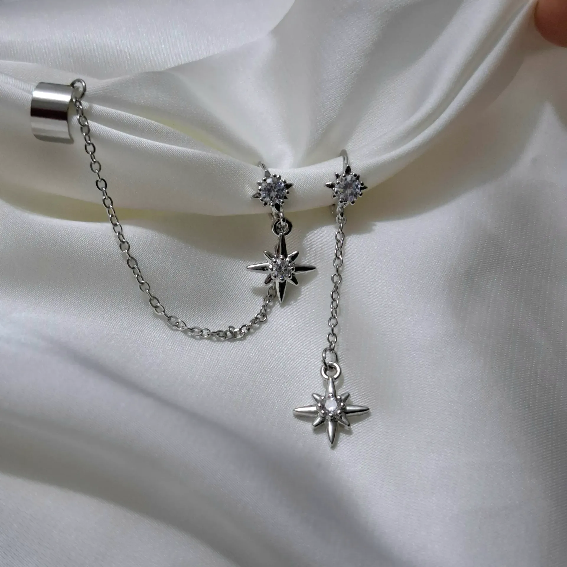 star earrings with fake piercing